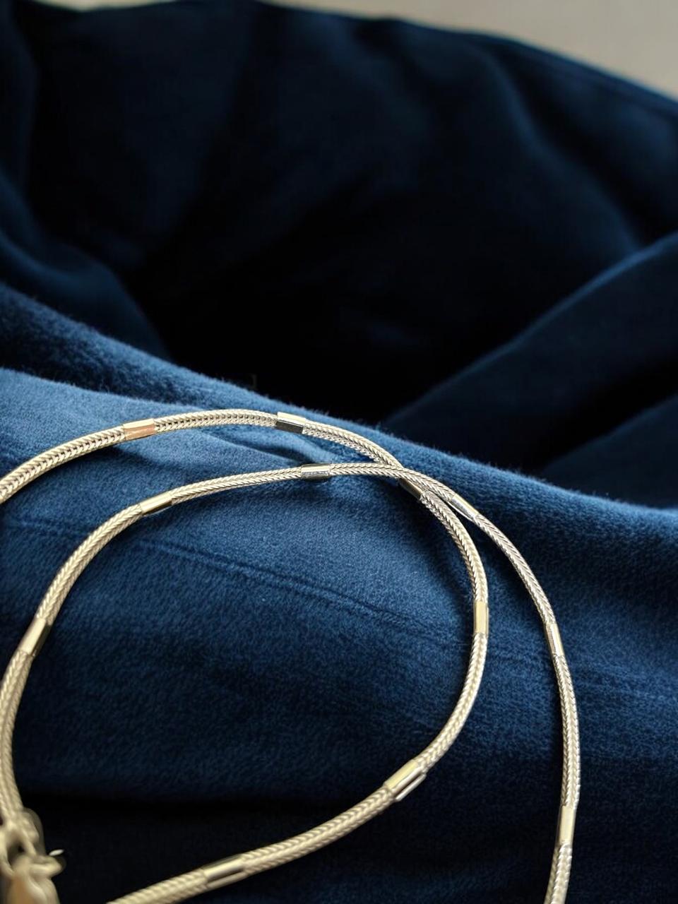 Silver Chain with unique plating in middle
