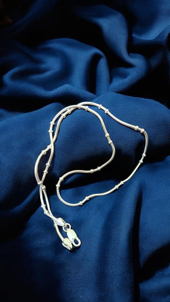 Silver Chain with beads in middle