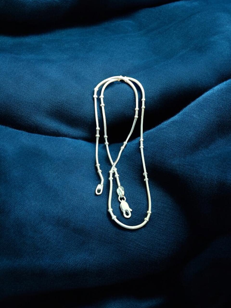 Silver Chain with beads in middle